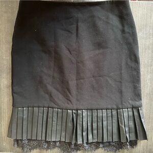 Karl Lagerfeld Black Skirt with leather and lace fringe detail.